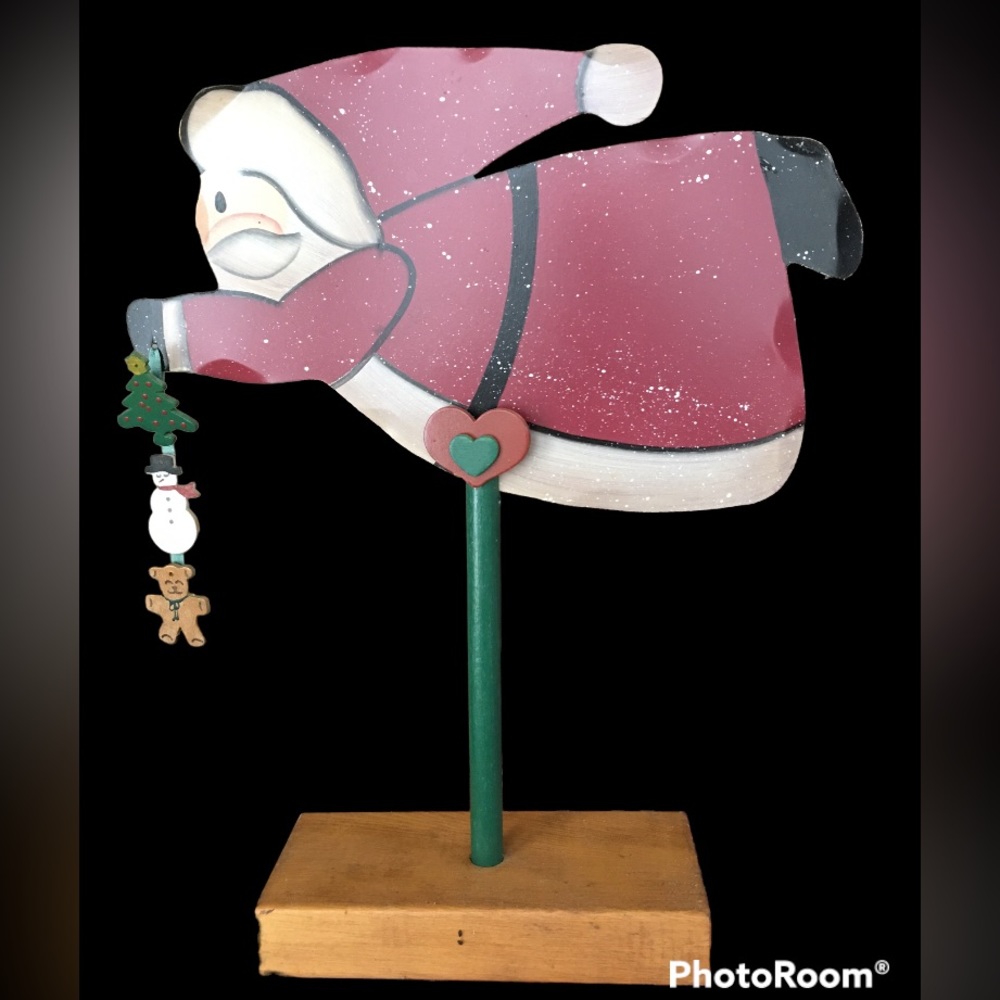 Flying Folk Art Santa. Handcrafted in tin. Hand painted.
